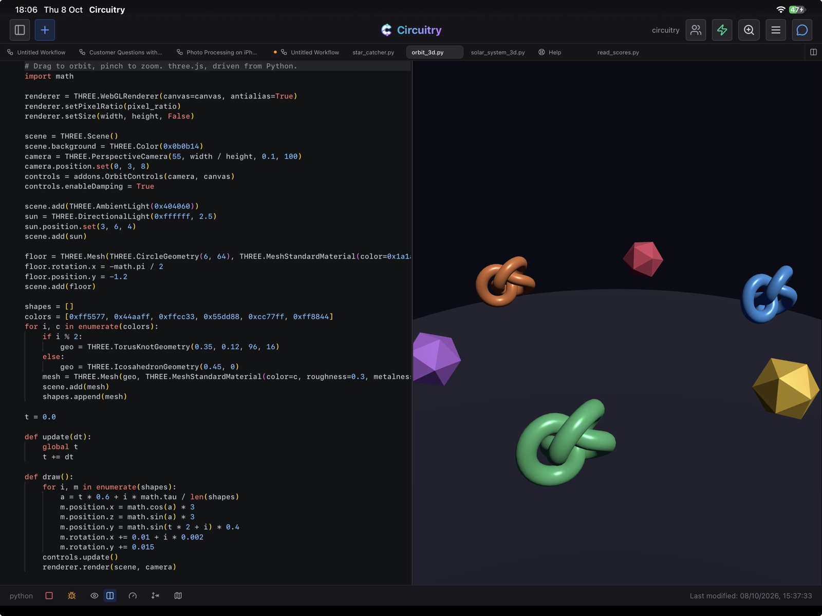 Circuitry on an iPad: a Python file on the left, and on the right the 3D scene it draws, coloured knots and gems over a floor